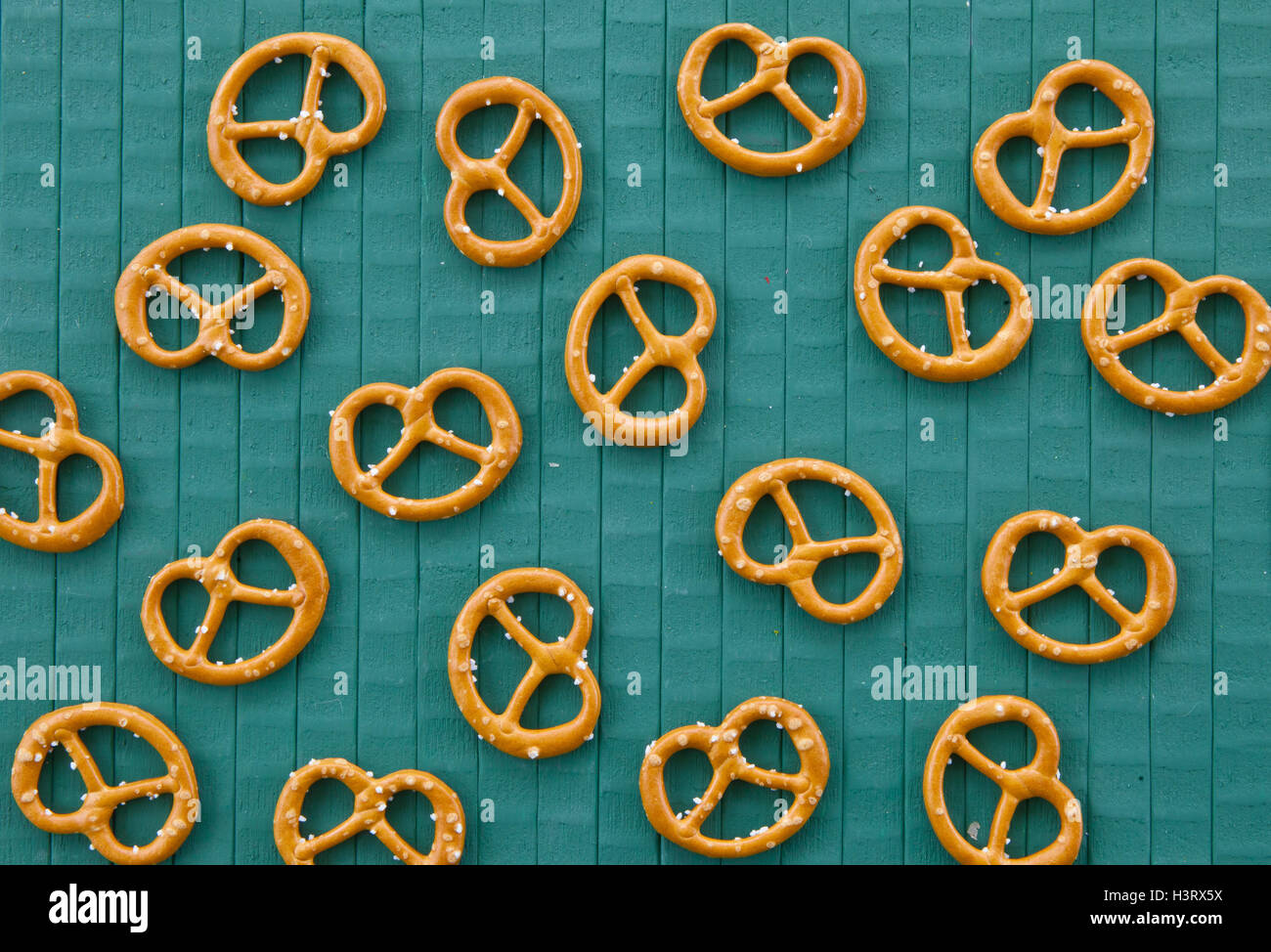 Pretzels on green Stock Photo Alamy