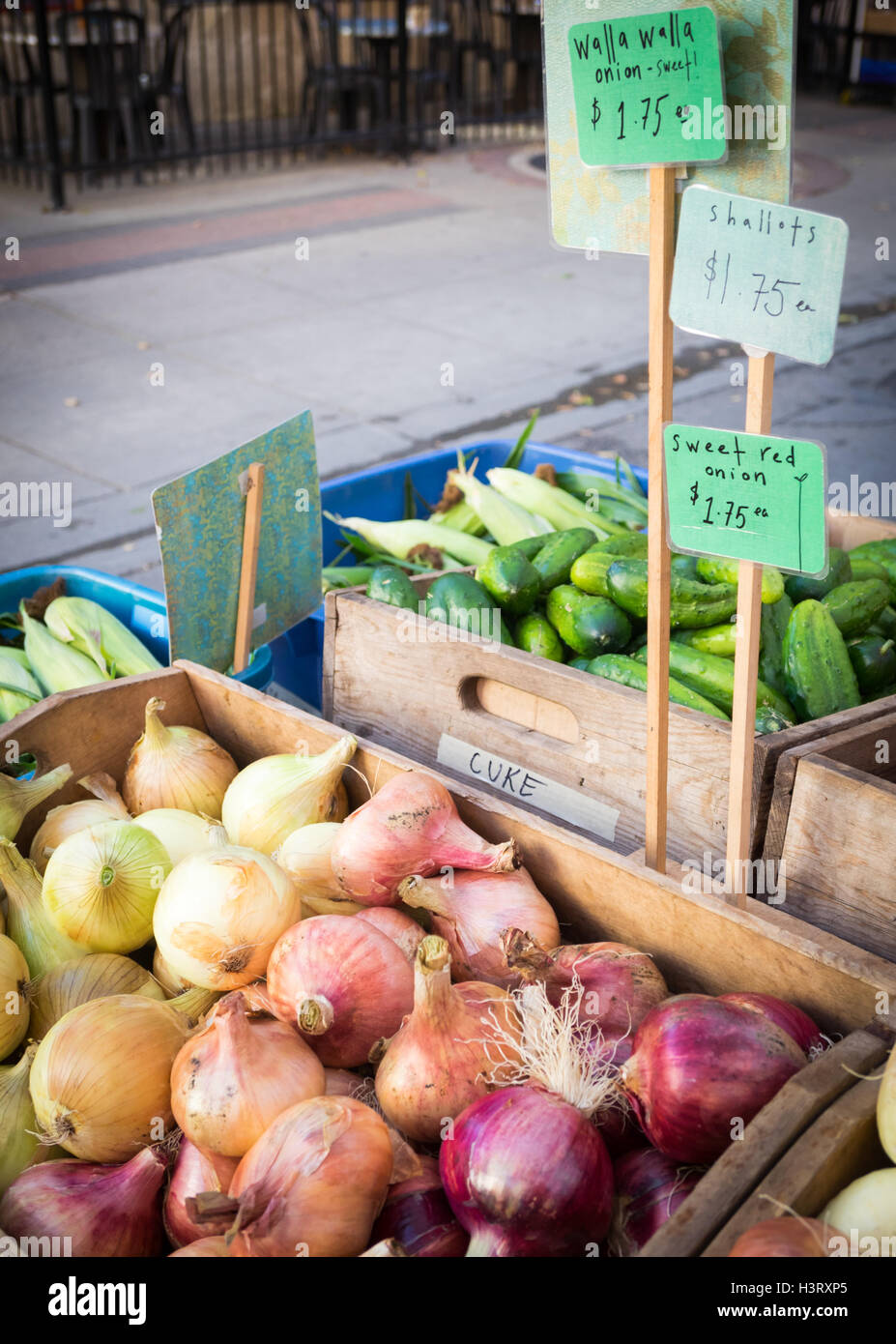 Walla Walla sweet onions (left), shallots (center), and sweet red onions (right) for sale at the City Market in Edmonton, Canada Stock Photo