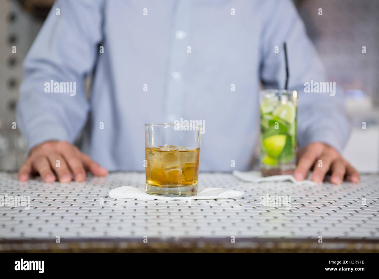Glass of whisky on bar counter Stock Photo Alamy