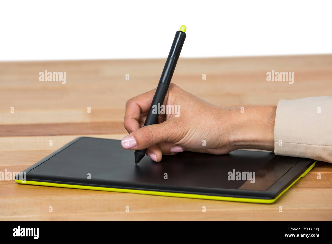 Hand of graphic designer using graphic tablet Stock Photo - Alamy