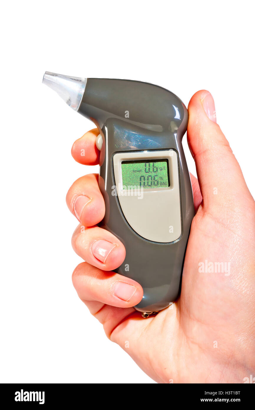 Breathalyzer in a female hand showing drunkenness Stock Photo - Alamy