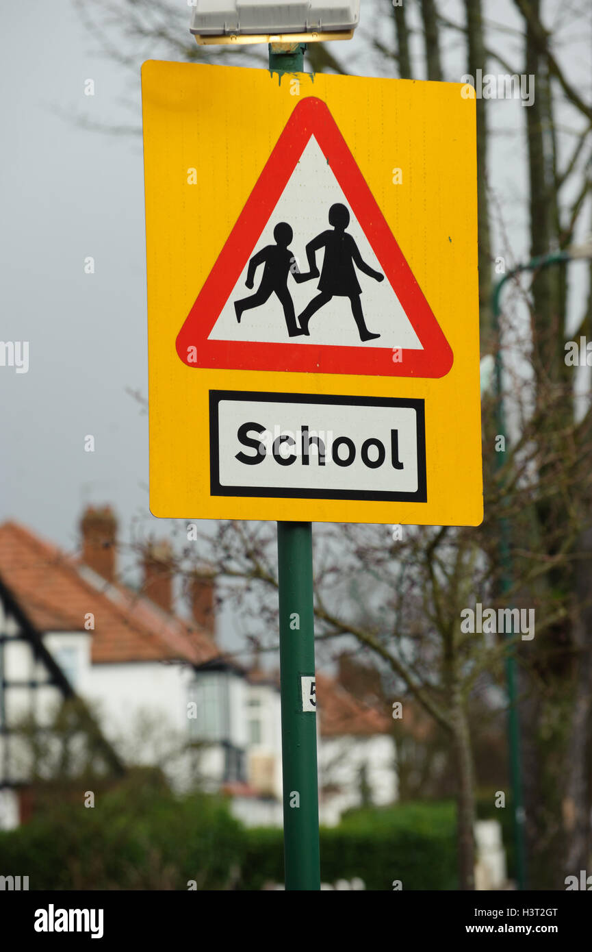 School ahead warning road sign Stock Photo