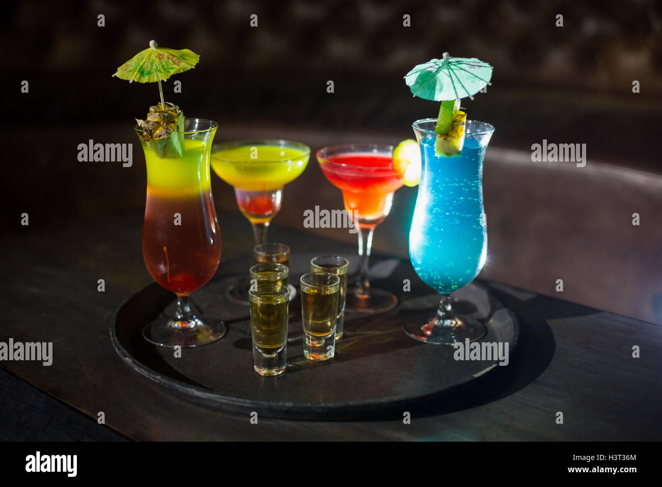 Various cocktail drinks and shot glasses of tequila on serving tray Stock  Photo - Alamy