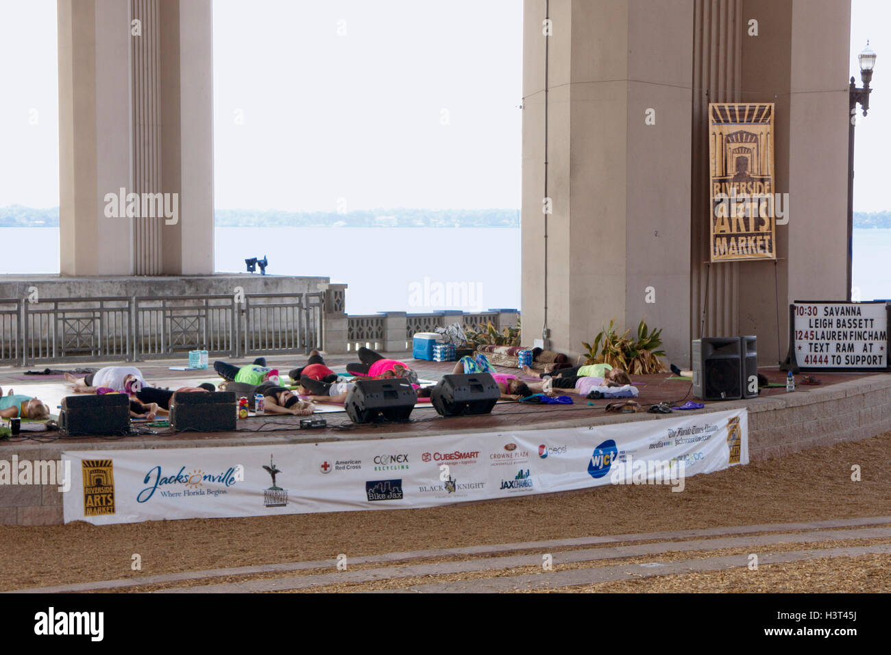 Yoga under the overpass on Saturdays at the Riverside Arts Market.  Jacksonville, Florida. Stock Photo