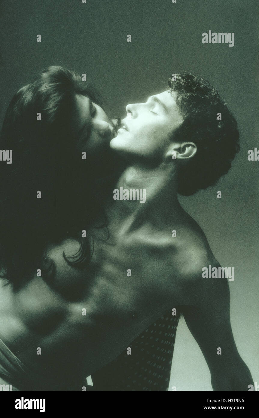Pin up pair, she kisses him, black-and-white recording Stock Photo