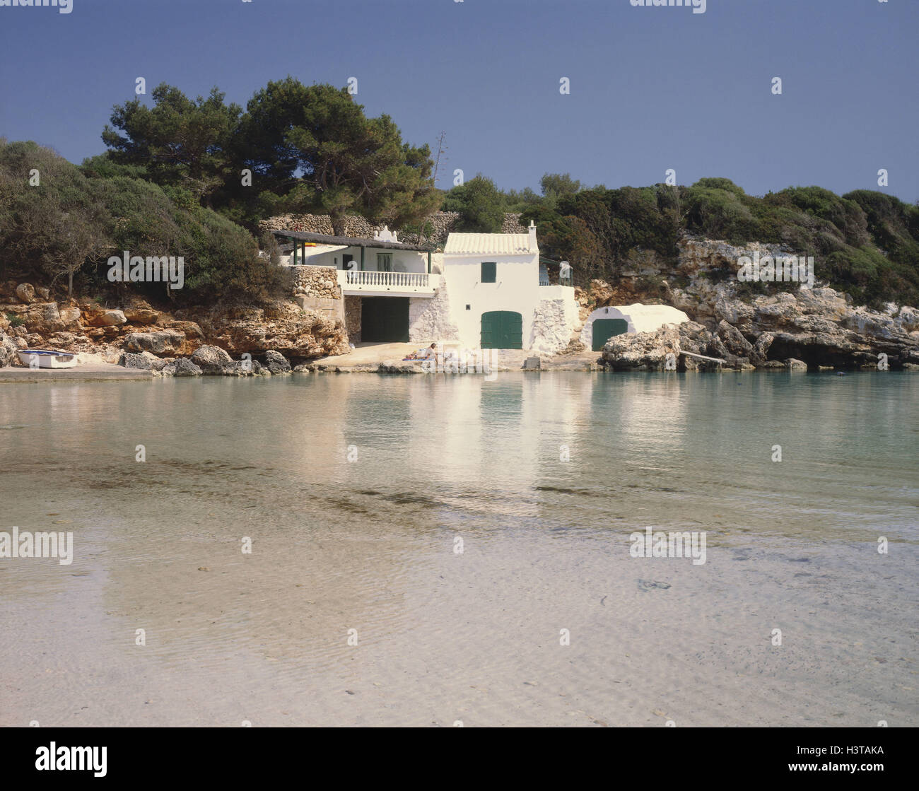 E / Menorca, Cala Binisafua, house by the sea Stock Photo
