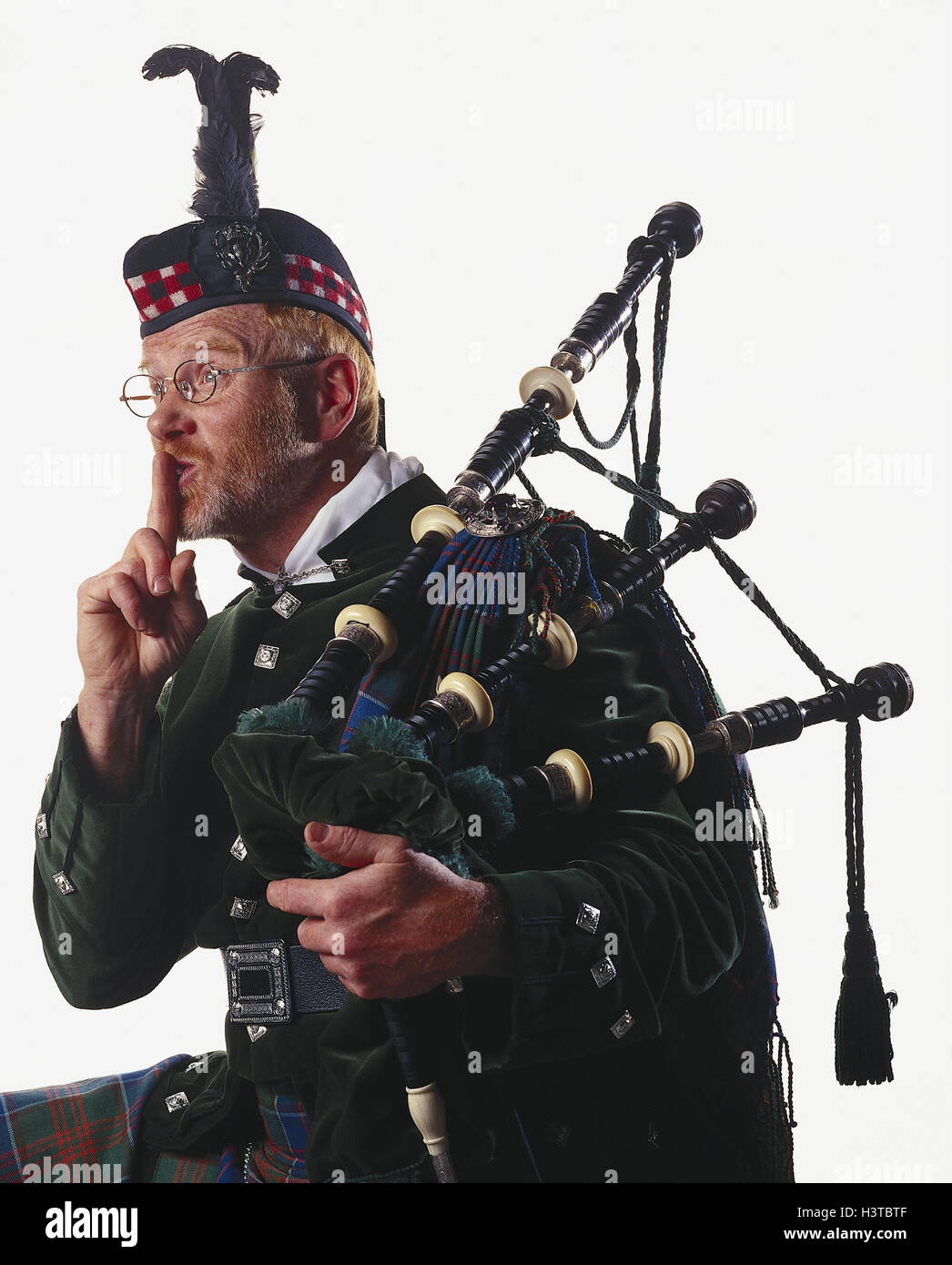 Scot, bagpipes player, gesture, "quiet" studio piper, bagpipes, pouch