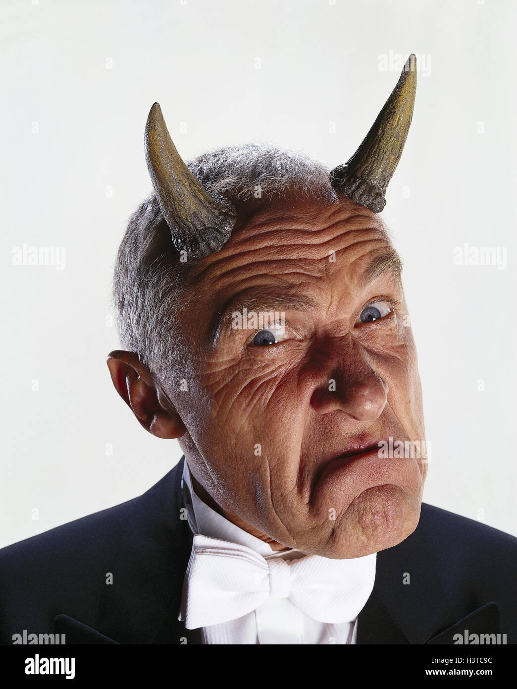 Man, "devil", head, horns, facial play, portrait, boss, lining, costume,  horn, nastily, maliciously, fiercely, unbelief, cunning, studio, copy space  Stock Photo - Alamy
