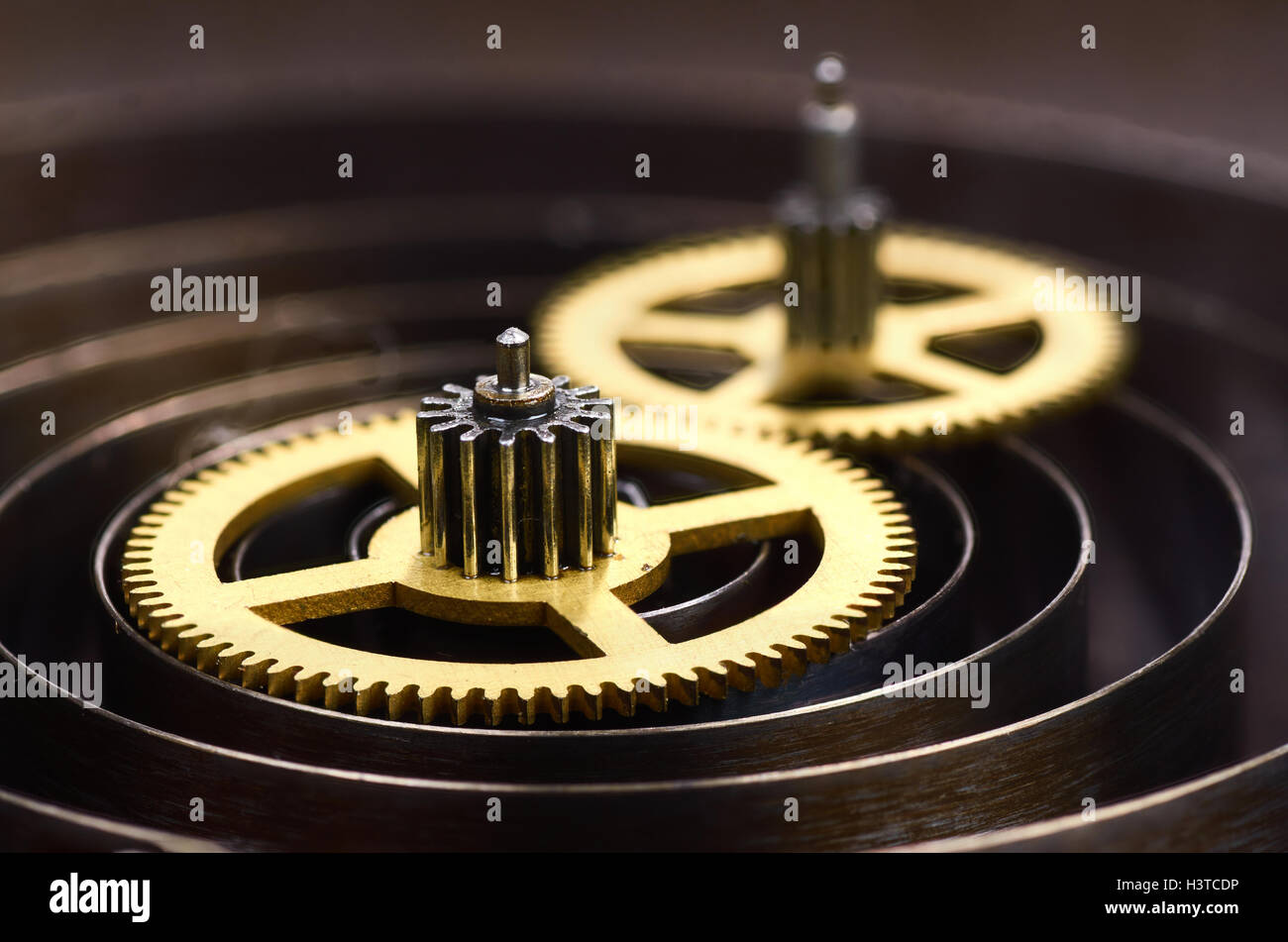 Gears and spring of hours close up Stock Photo - Alamy