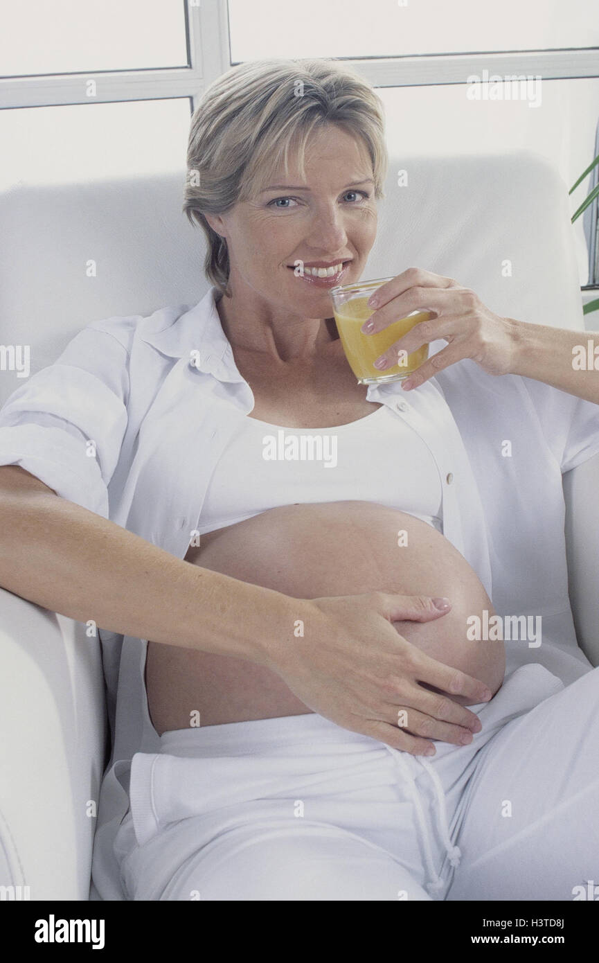 Woman, pregnant, orange juice, drink, happy, gestation, pregnant