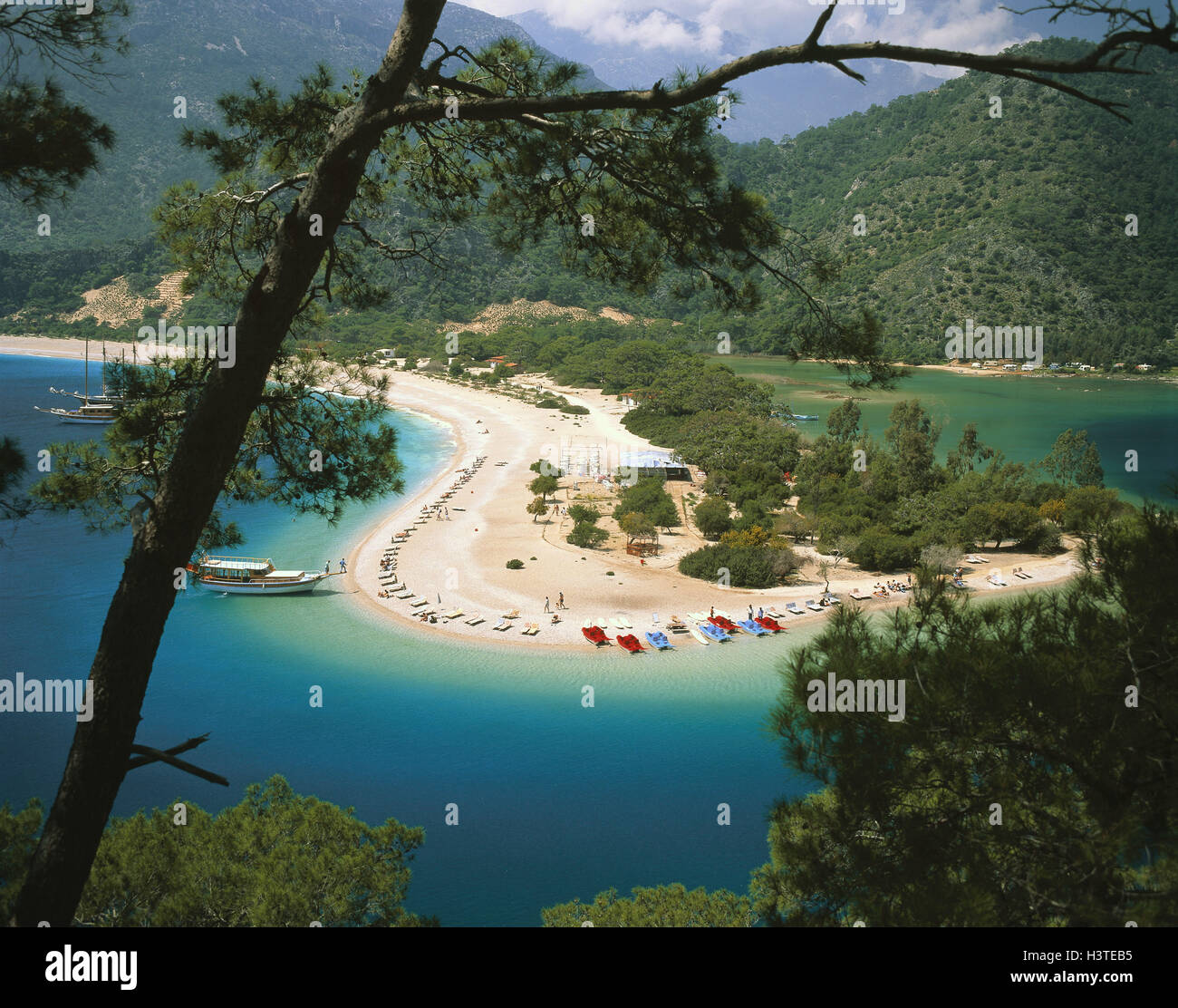 Turkey, Ölüdeniz, bay, beach, Europe, boots, sea, beach, vacation, mountains, cloudy sky Stock Photo