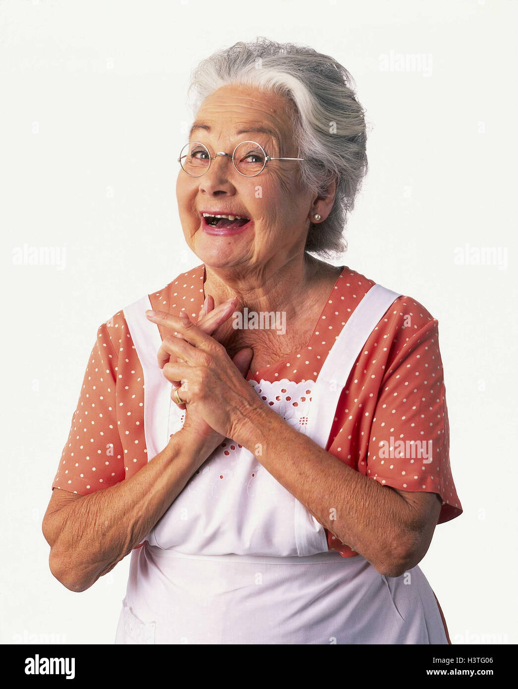 Senior, apron, gesture, delights, half portrait, boss, inside, copy space, woman, old, hairs, grey, glasses, granny, housewife, smile, please delight, happily, joy, enthusiasm, enthusiastically, studio, Stock Photo