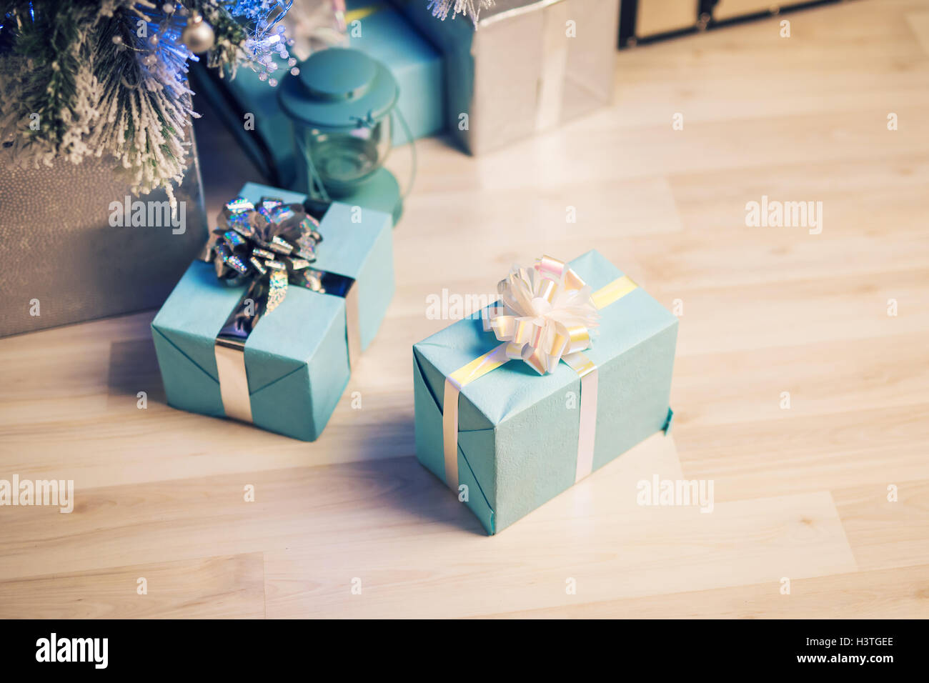 Close up decorated fir tree and gift boxes Stock Photo - Alamy