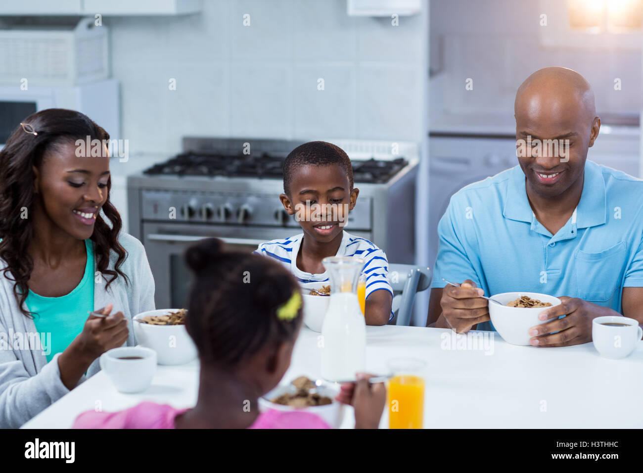 Family having breakfast Stock Photo - Alamy