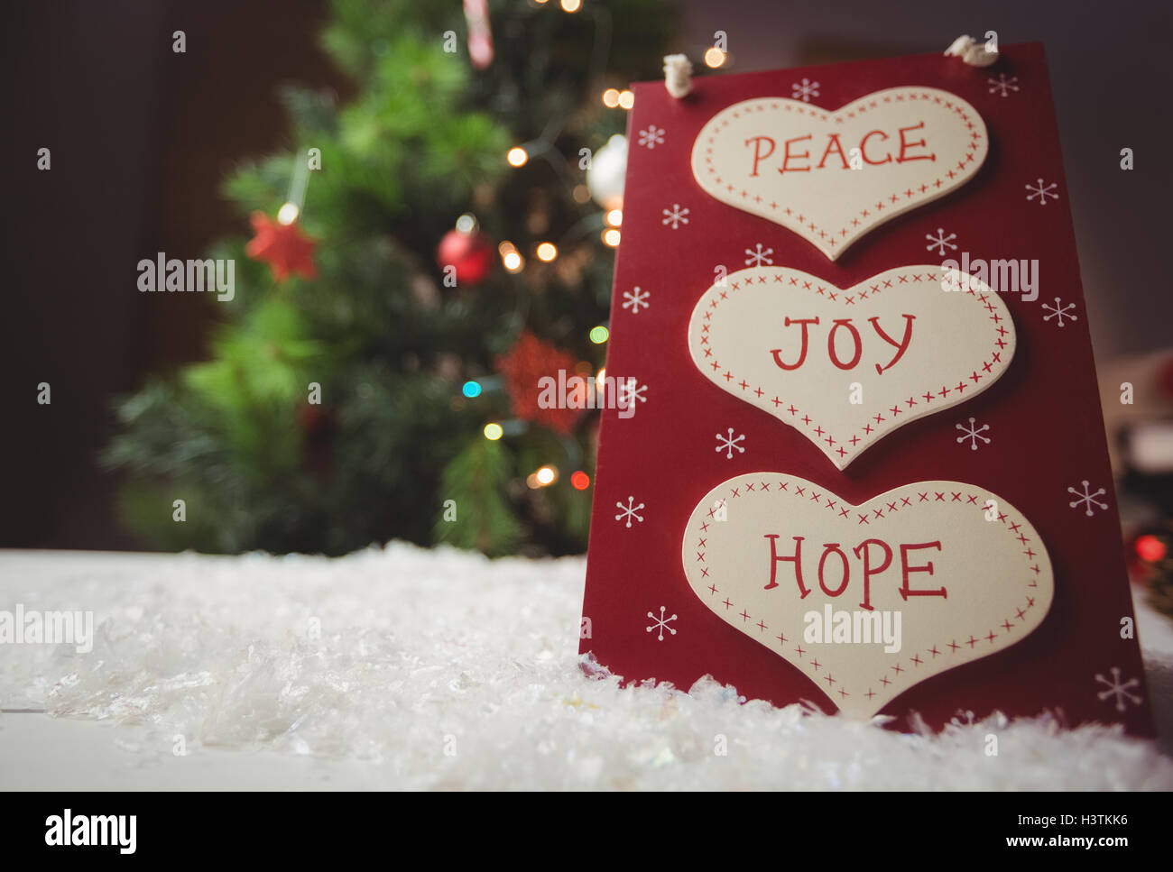 Christmas label with massages of peace, joy and hope Stock Photo
