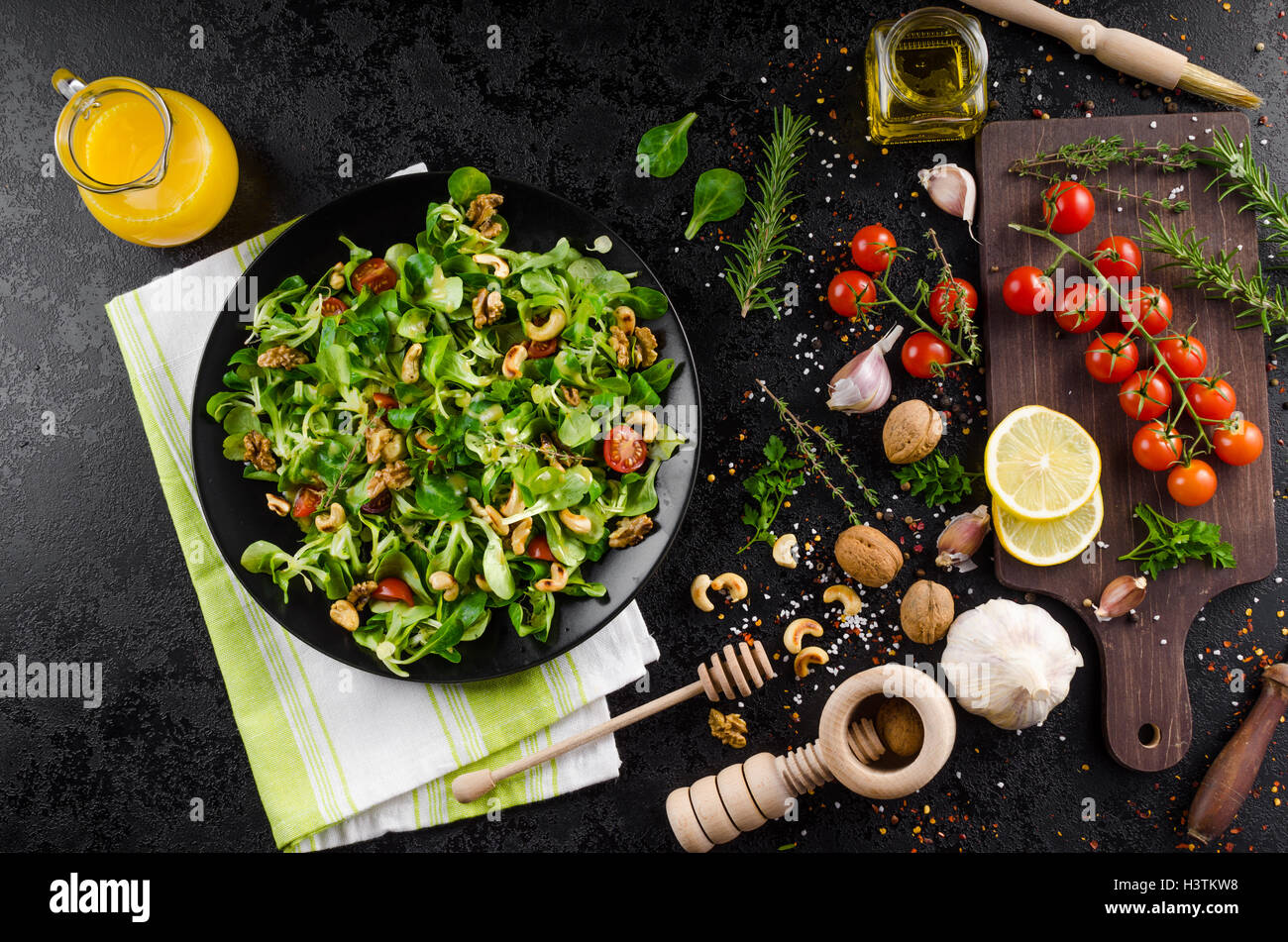 Lamb's lettuce salad with walnuts with mustard dressing Stock Photo Alamy