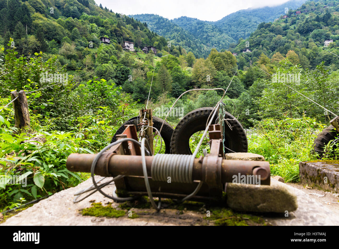 Steel wire rope way pulley system using for easy transportation between main roads and mountain houses in Senyuva village Stock Photo