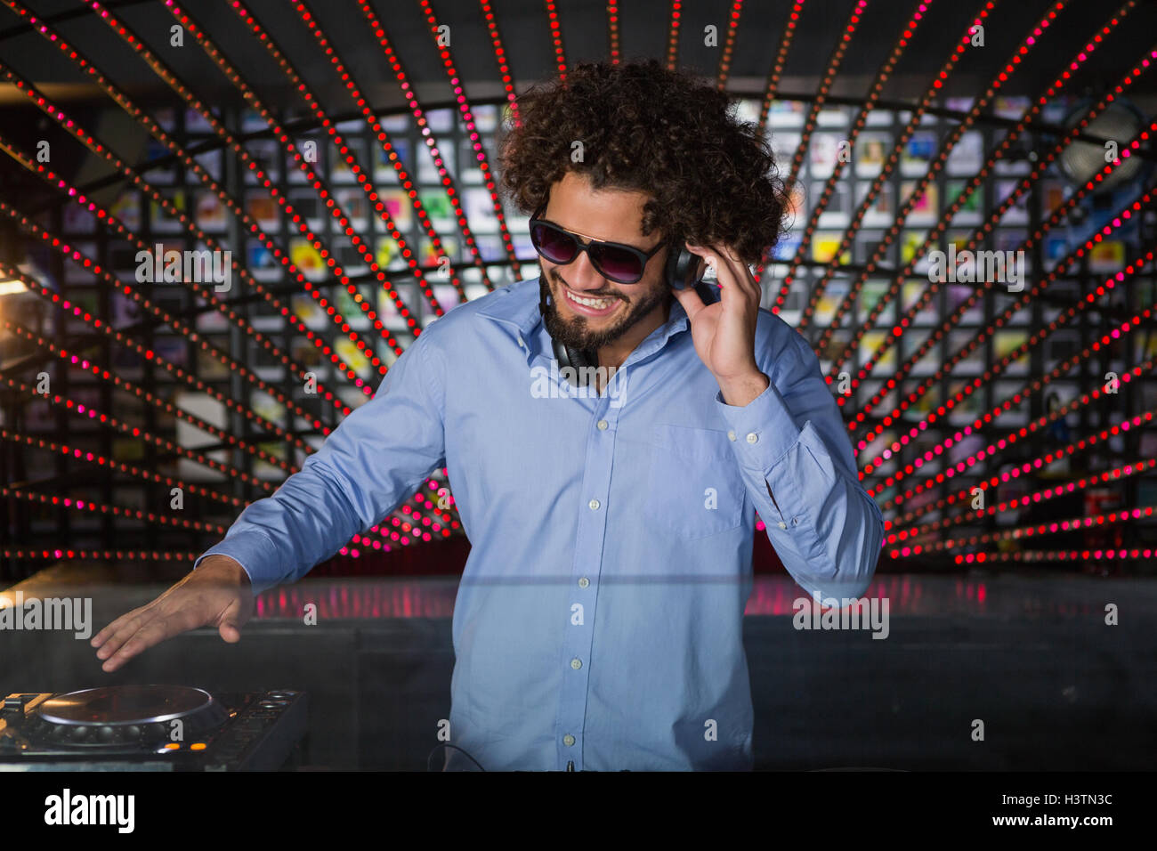 Male DJ playing music Stock Photo Alamy