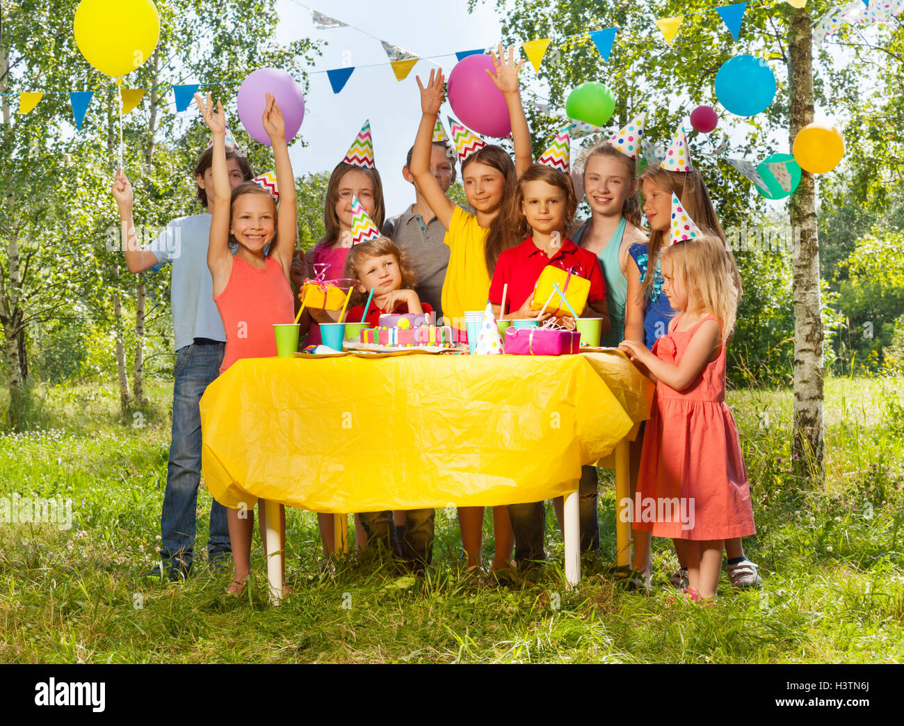 happy-kids-having-fun-at-outdoor-birthday-party-stock-photo-alamy