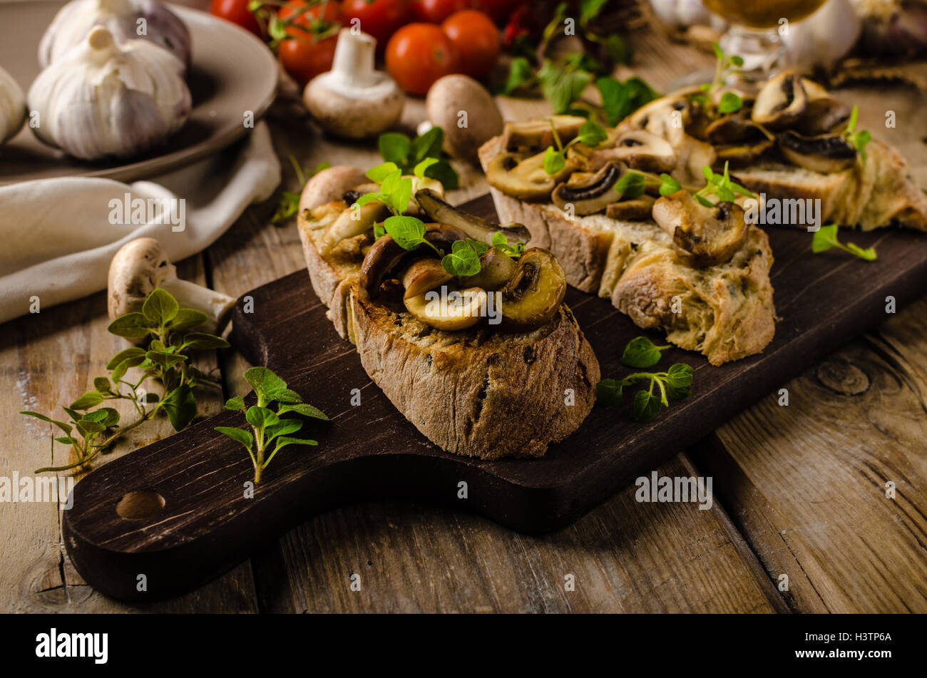 Rustic Toaste Rustic Toast bread with garlic, mushrooms and herbs, rustic styled ...
