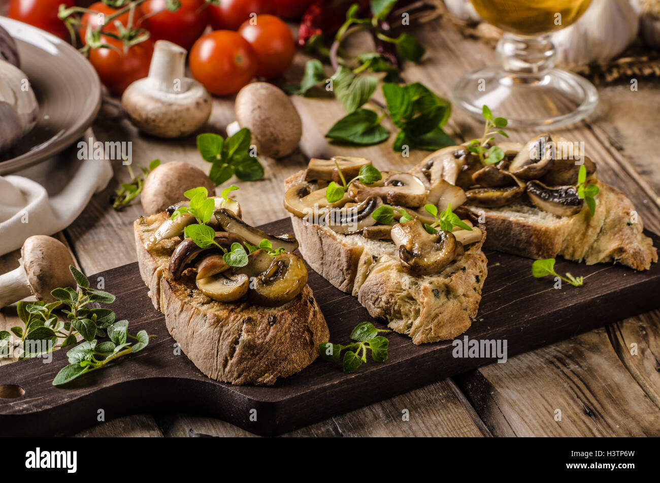 Rustic Toaste Rustic Toast bread with garlic, mushrooms and herbs, rustic styled ...