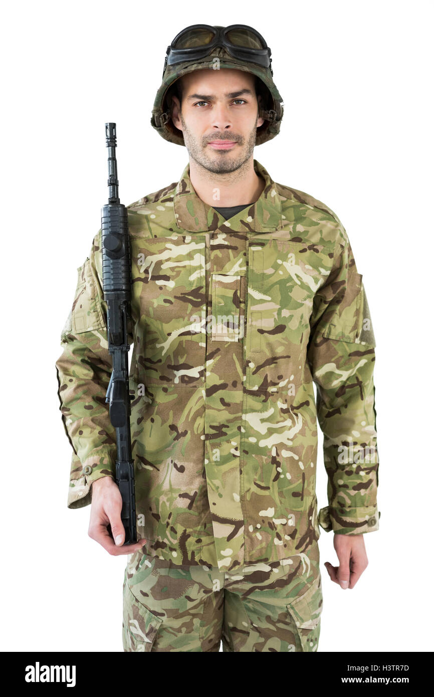 Portrait of soldier holding a rifle Stock Photo - Alamy