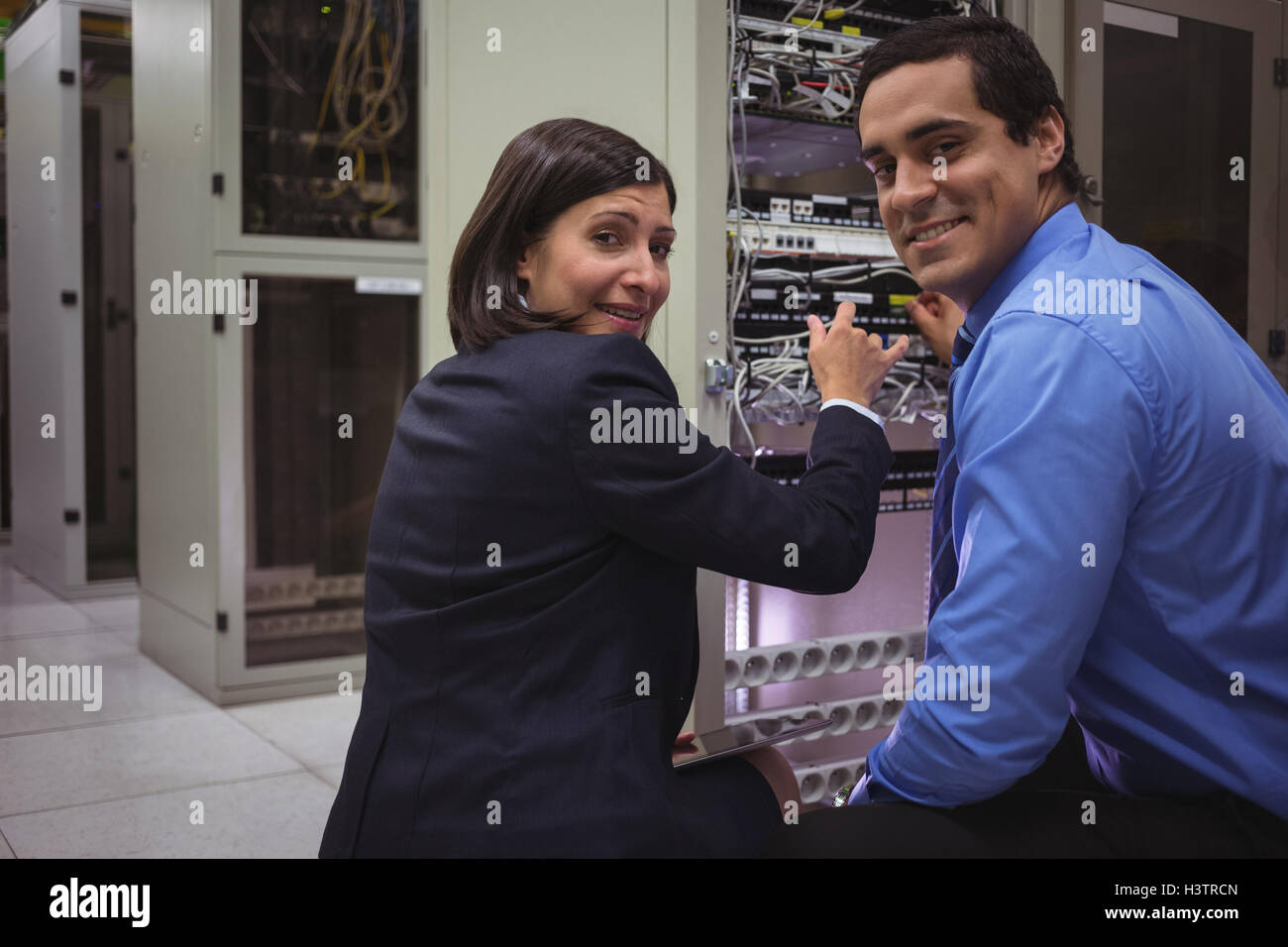 Cheerful data center technicians hi-res stock photography and images ...
