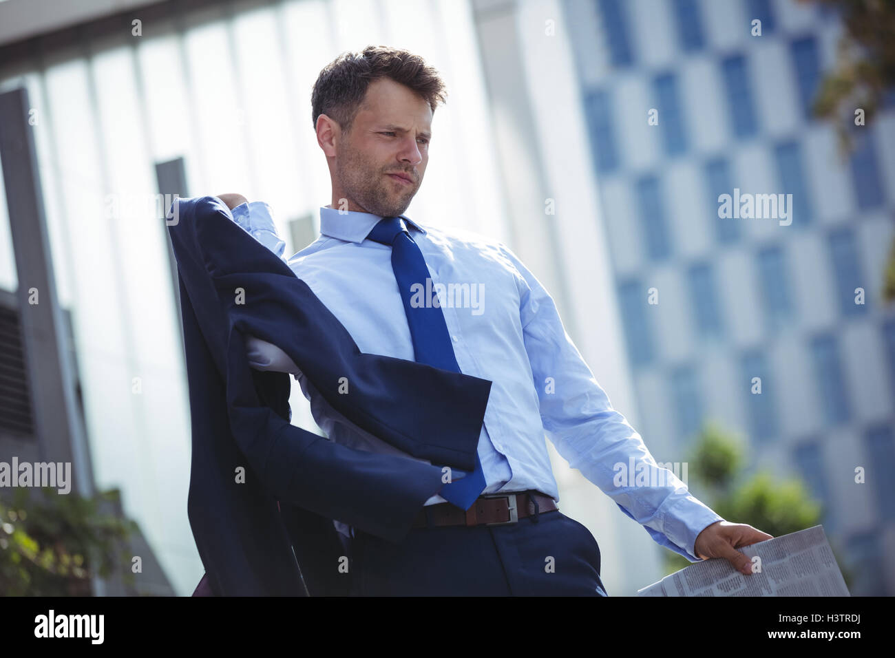 Holding blazer hi-res stock photography and images - Alamy