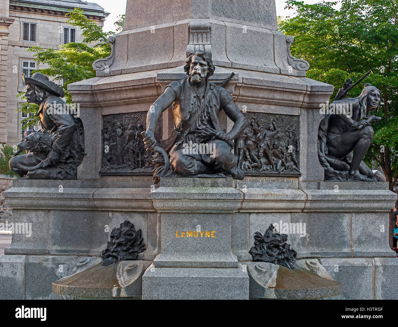 Figures at the base of Paul Chomedey de Maisonneuve memorial, founder of the old Montreal, Place d'Armes, Montreal, Quebec Stock Photo