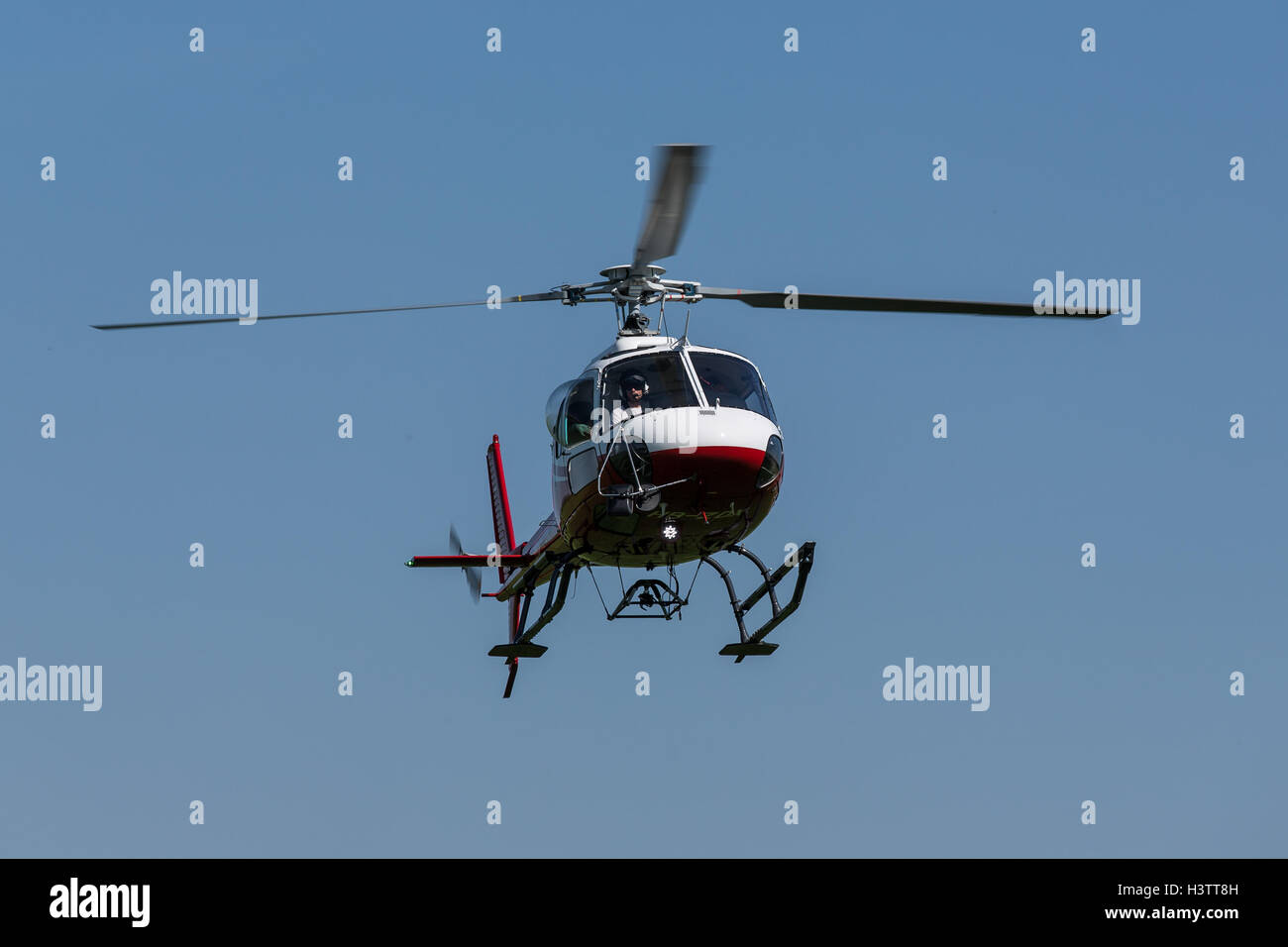 Helicopter EC 120B Colibri in the air, Pfaffnau, Lucerne, Switzerland Stock Photo