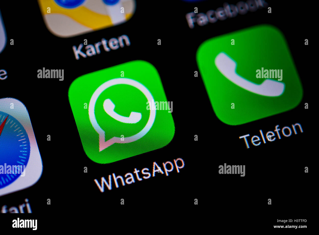 Smartphone screen with WhatsApp and Phone app icons Stock Photo