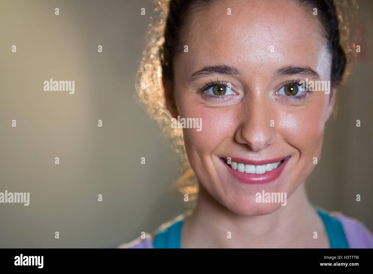 Portrait of smiling fit woman Stock Photo - Alamy