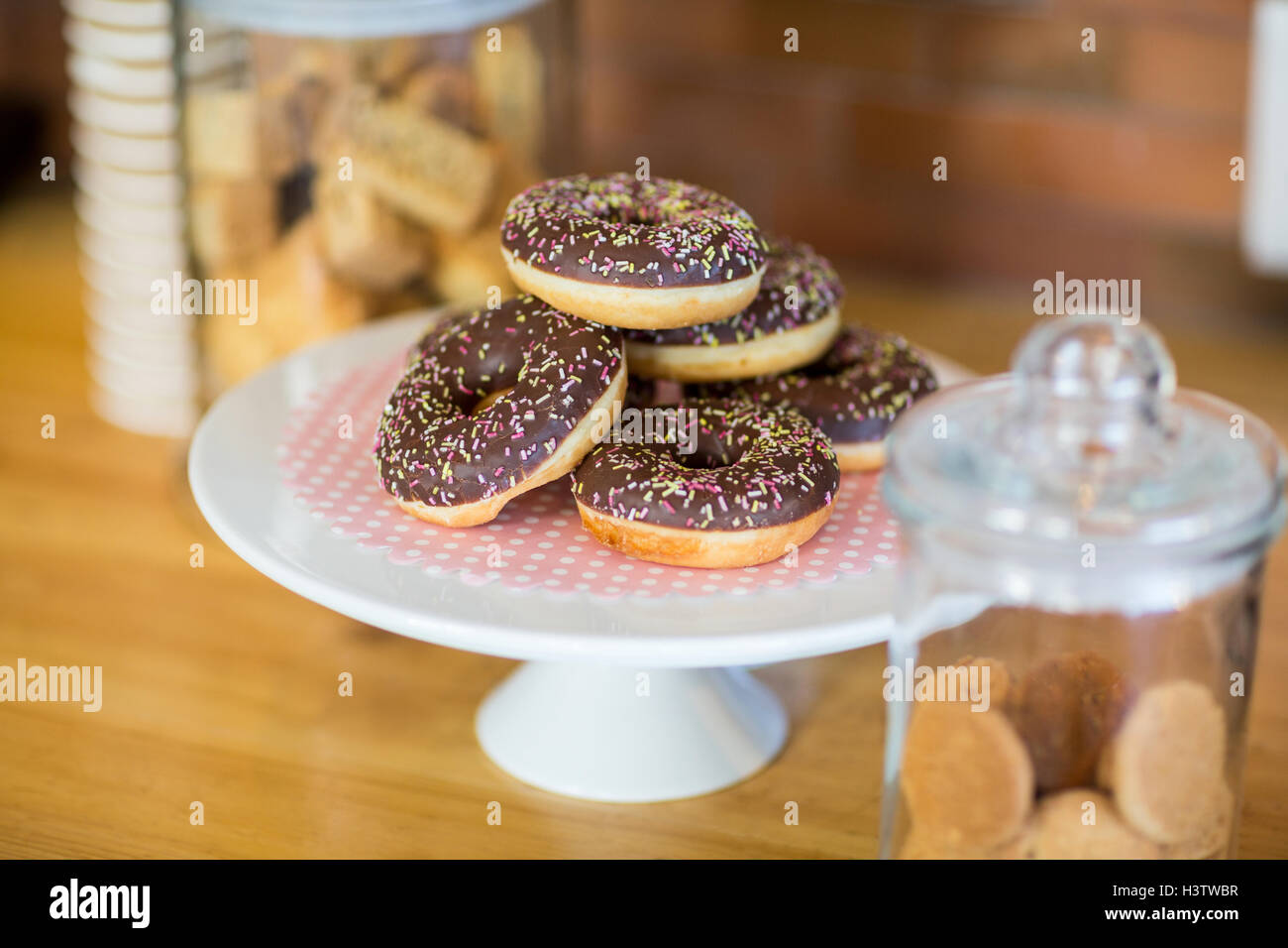 Doughnuts on cake stand Stock Photo