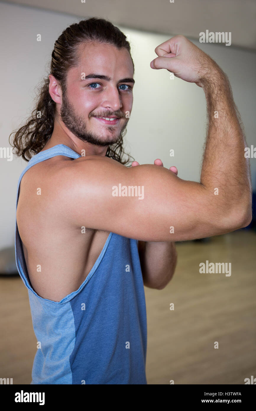 Man flexing arm muscle hires stock photography and images Alamy