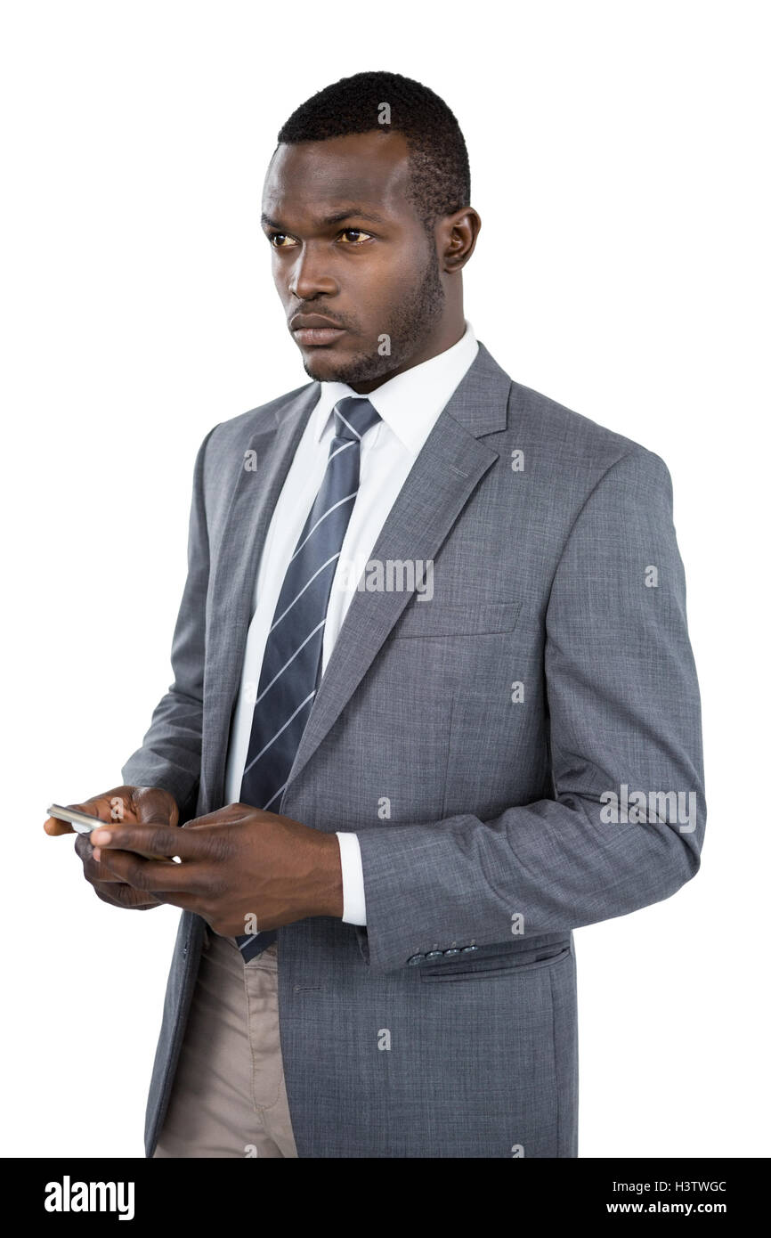 Businessman holding mobile phone Stock Photo - Alamy