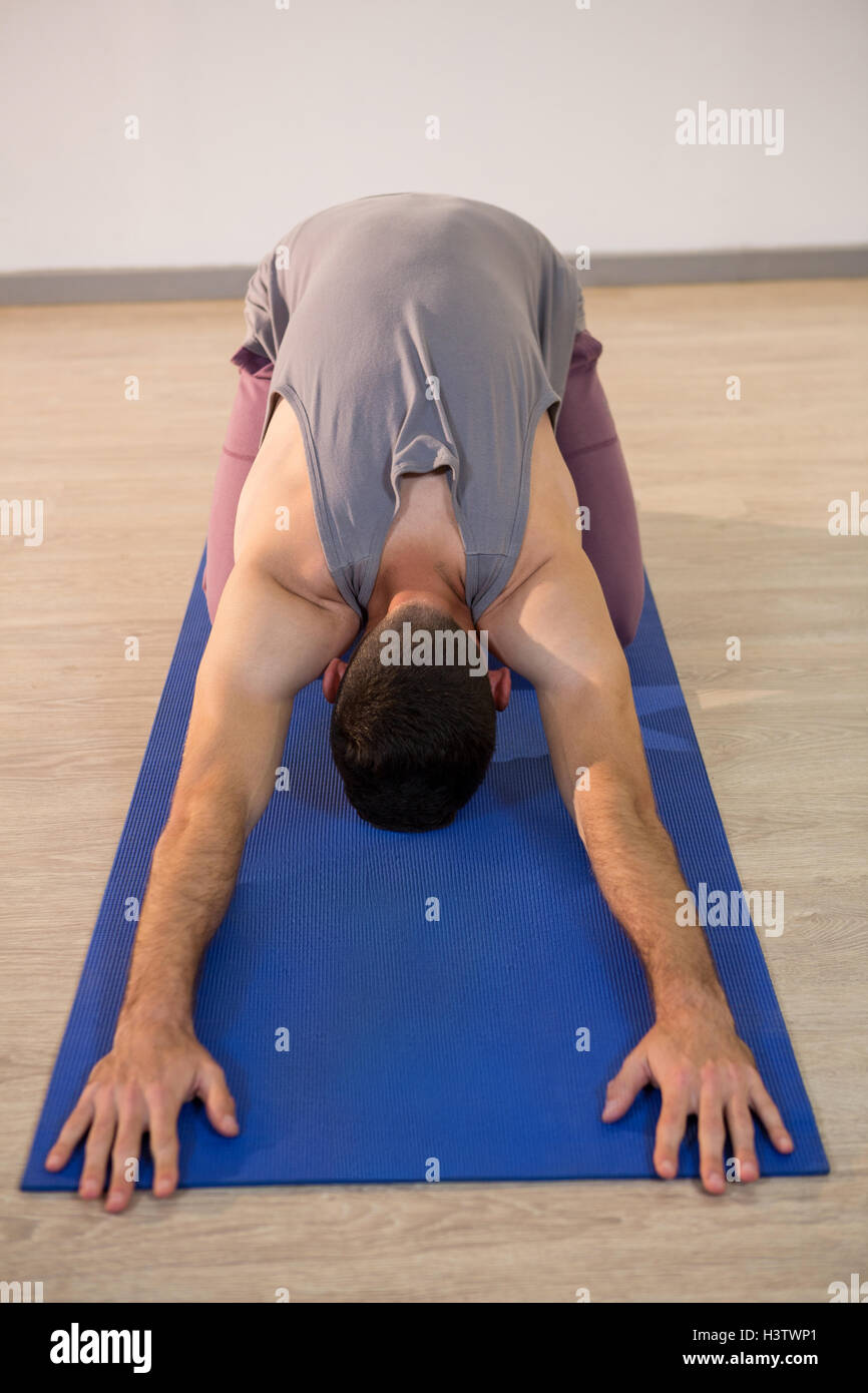 Man performing yoga Stock Photo