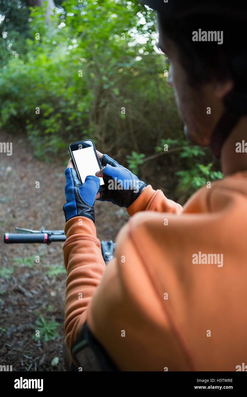 Male biker using smart hi-res stock photography and images - Alamy
