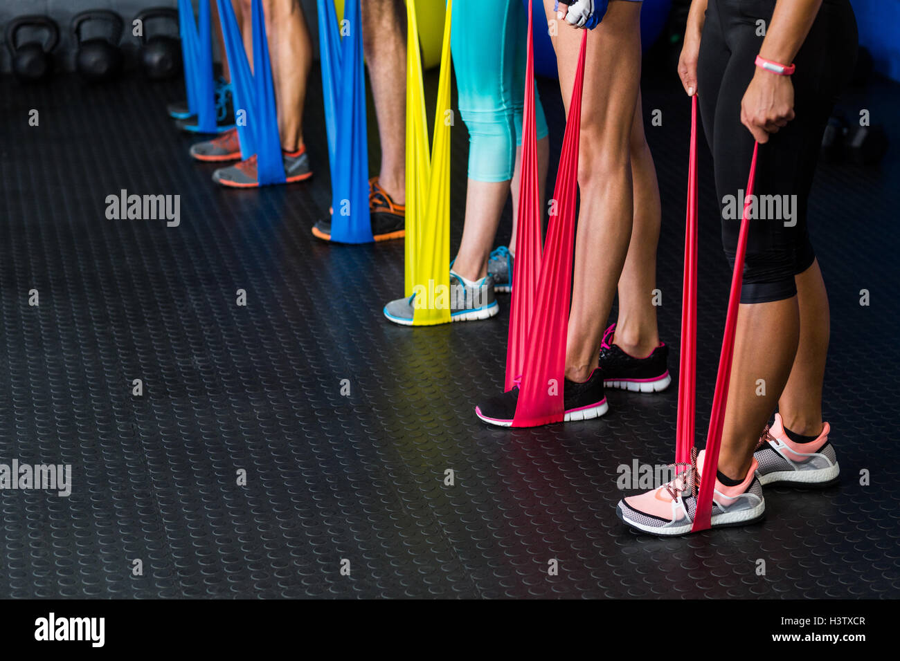Athletes exercising with resistance band Stock Photo Alamy