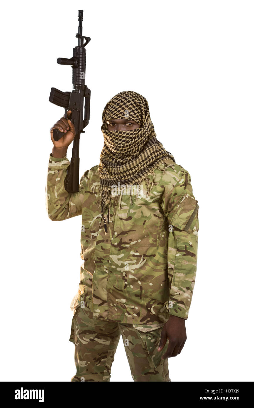 Portrait of soldier holding a rifle Stock Photo Alamy