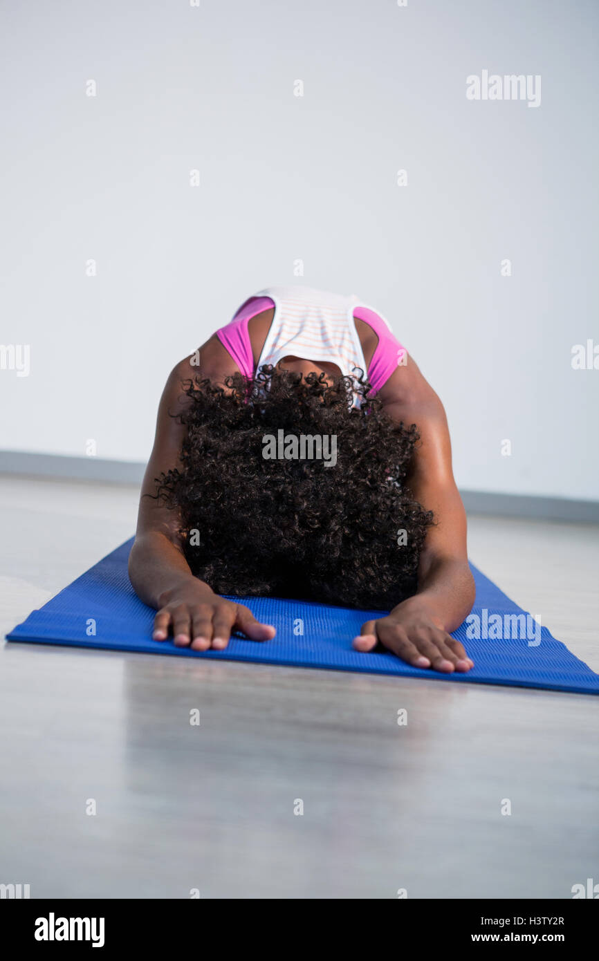 Woman performing yoga Stock Photo