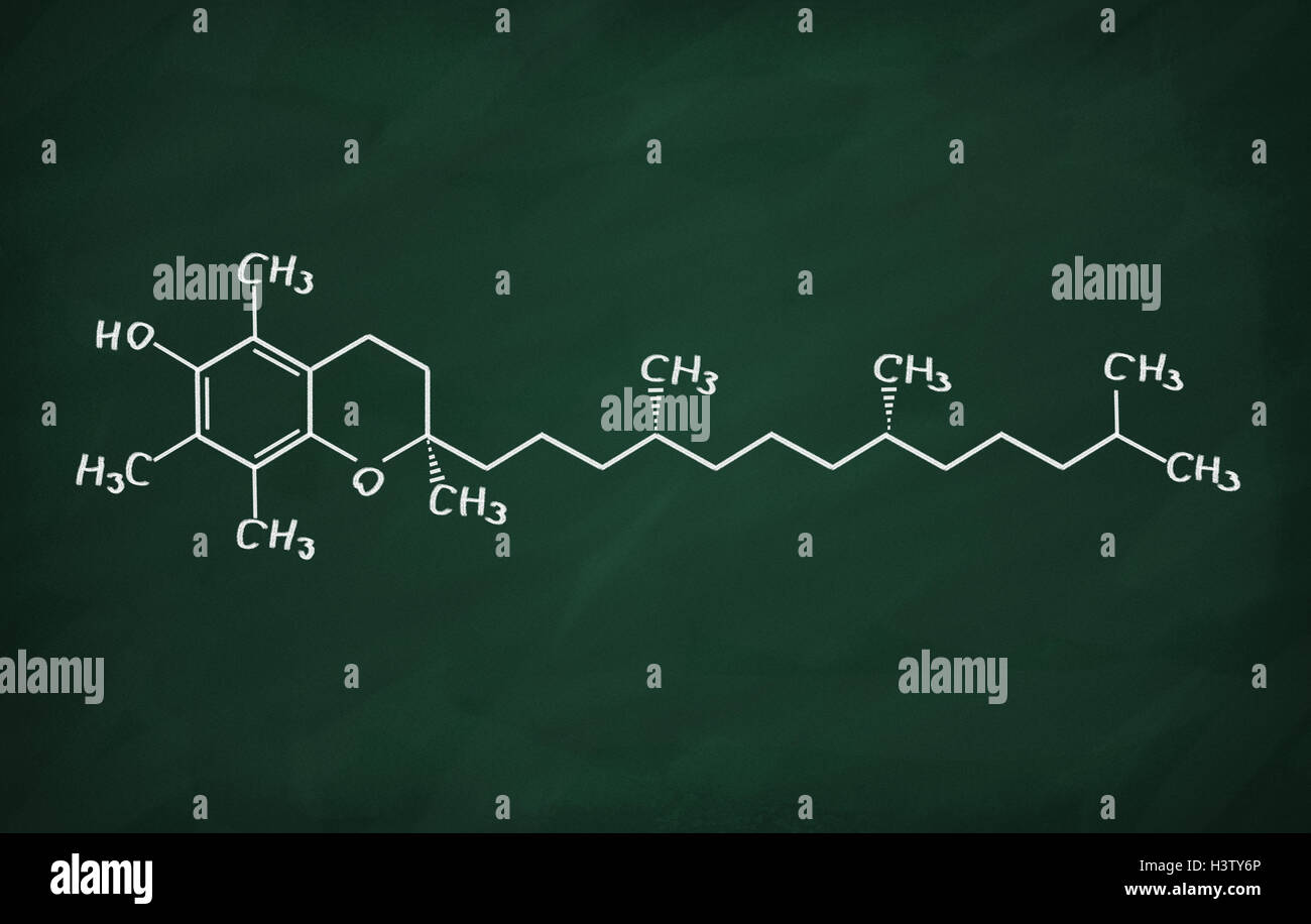 Structural model of Vitamin E (tocopherol) on the blackboard. Stock Photo