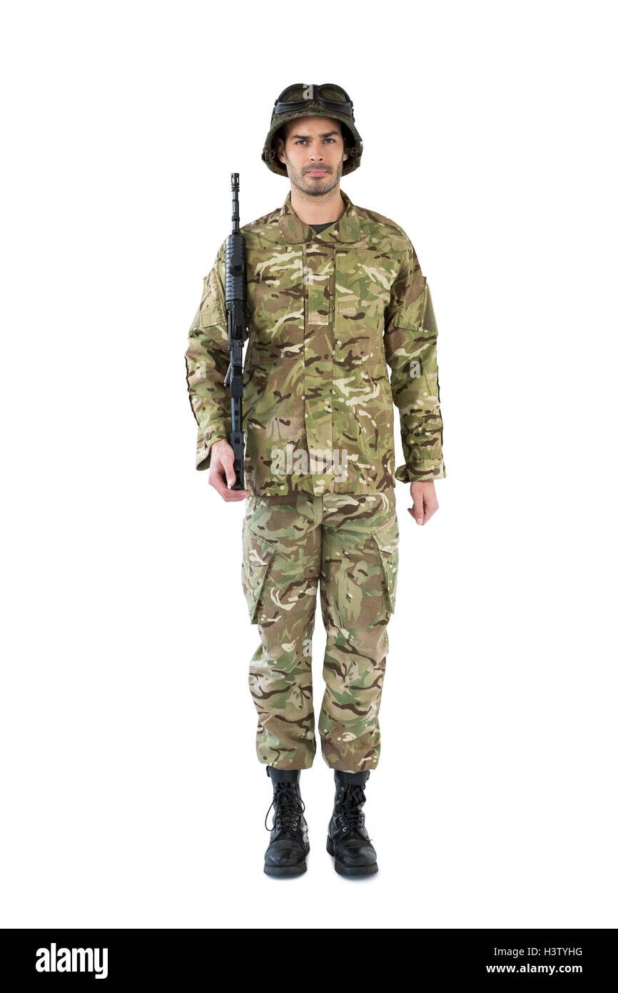 Portrait of soldier holding a rifle Stock Photo - Alamy