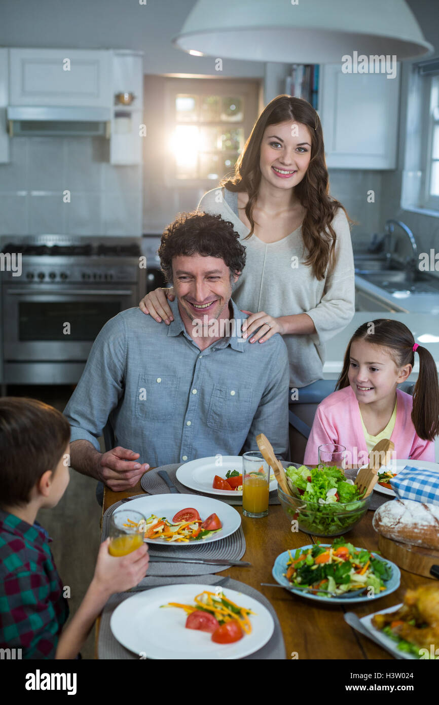 Happy family having breakfast Stock Photo - Alamy