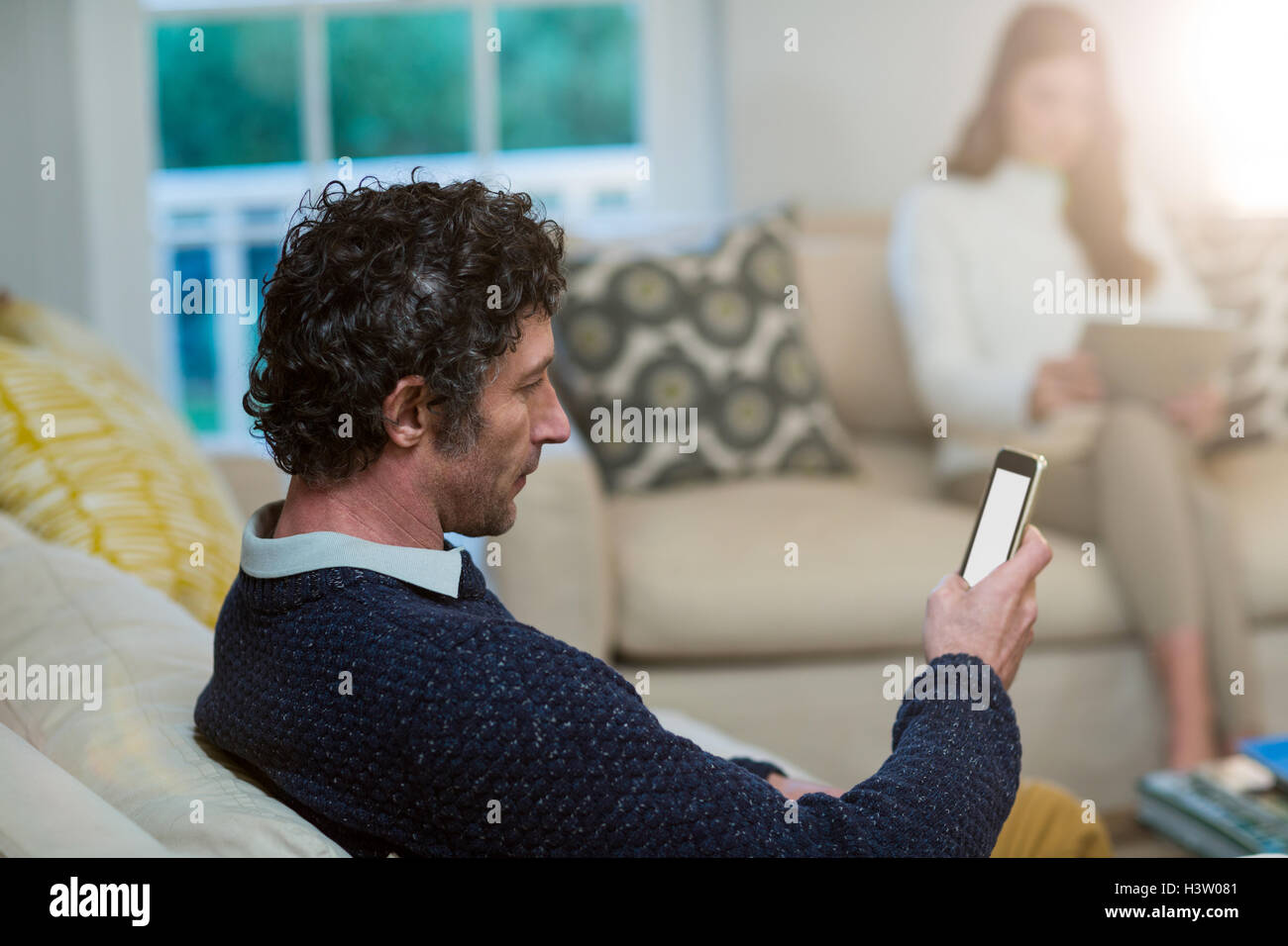 Man using mobile phone Stock Photo - Alamy