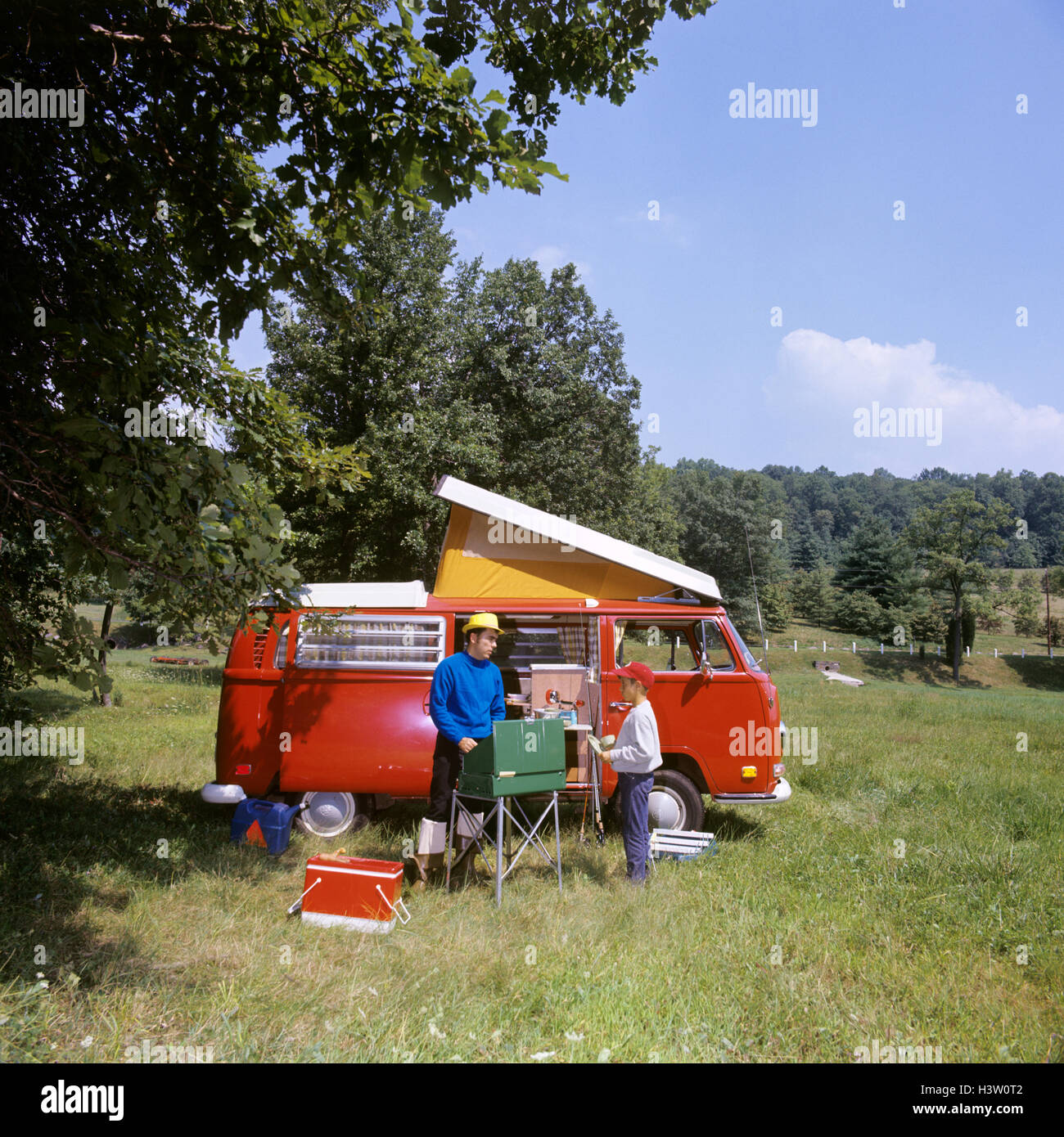 Fathers And Sons VW >> 1970s Father And Son Cooking At Campsite Beside Red Pop Top Fathers And Sons VW >> 1970s Father And Son Cooking At Campsite Beside Red Pop Top