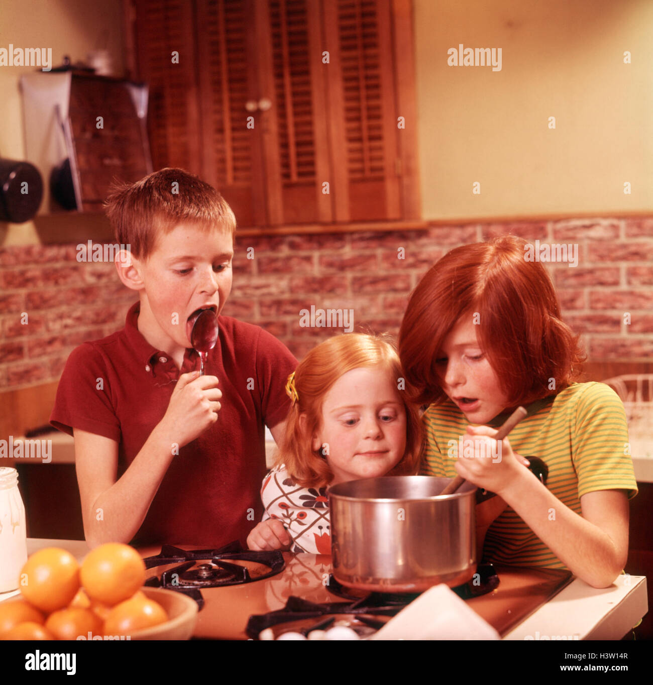 1970s 3 KIDS GIRLS BOY MAKING FUDGE BOY LICKING SPOON GIRL STIRRING PAN