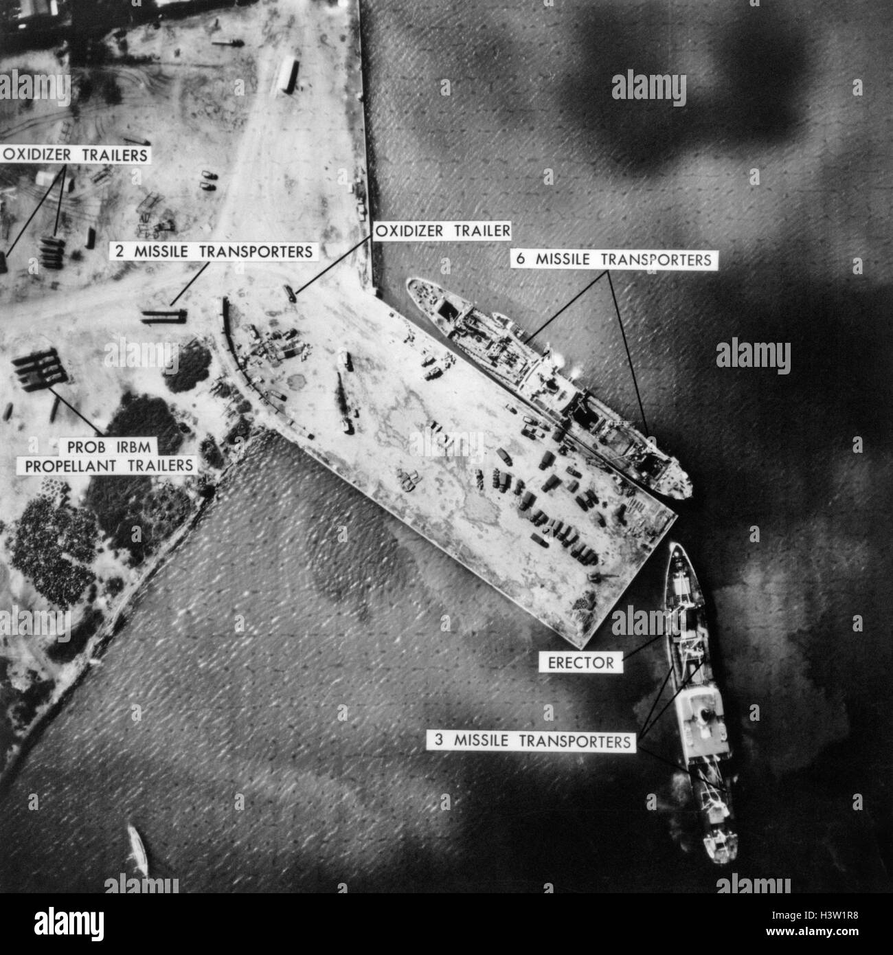 1960s NOVEMBER 5 1962 PHOTO REVEALS MISSILE EQUIPMENT NOW LOADED ON FREIGHTERS PREVIOUSLY ON DOCKSIDE CUBAN MISSILE CRISIS Stock Photo