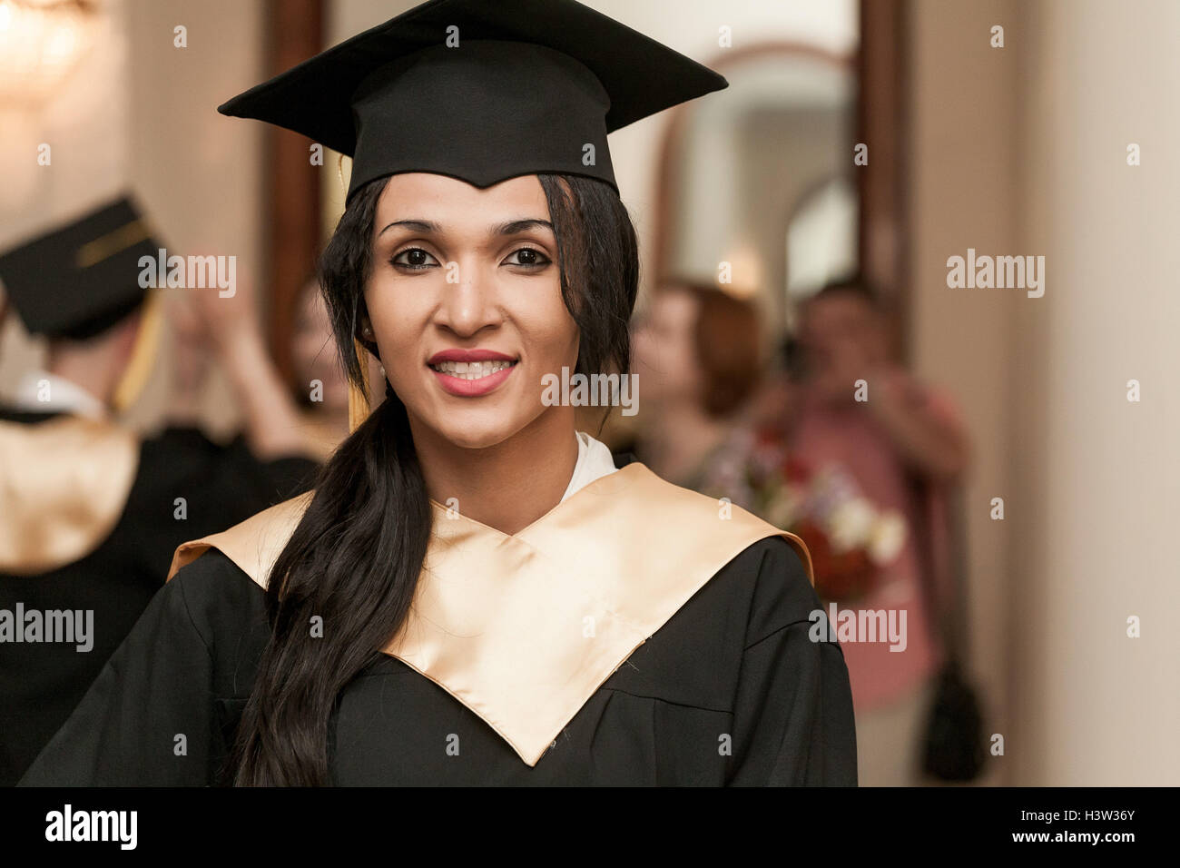Graduate students wearing graduation hat Stock Photo Alamy