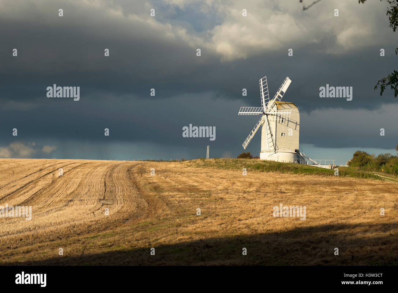 The restored Ashcombe windmill stands on a ridge to the east of the village of Kingston near Lewes, East Sussex, UK Stock Photo