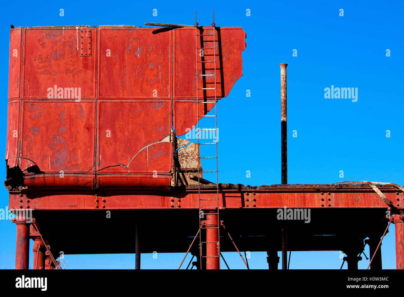 Decaying remains of old water tank at the Curdimurka rail siding on Old Ghan rail line. Stock Photo